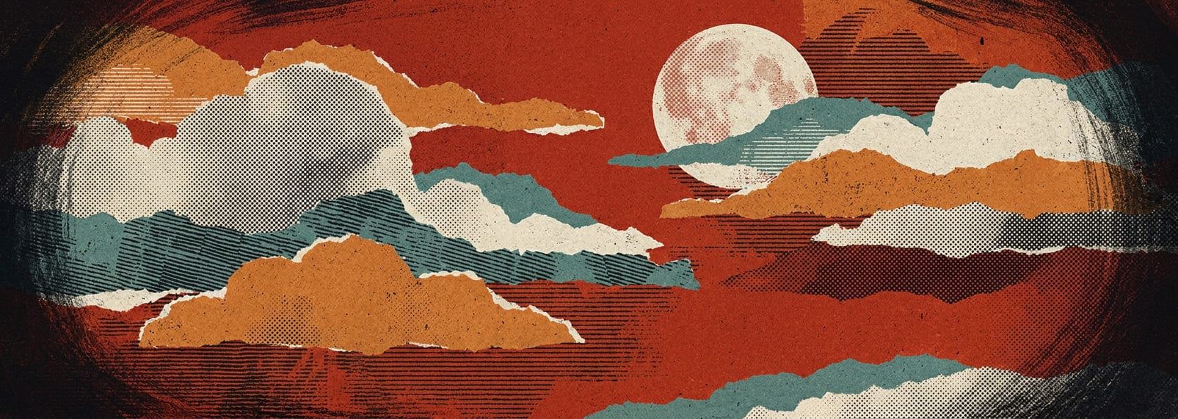 A full moon behind torn cloud
