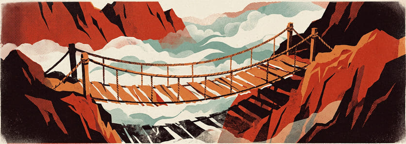 A rope bridge spanning a gorge in fog